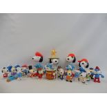 A tray of Smurfs and Snoopy figures, circa 1980s.