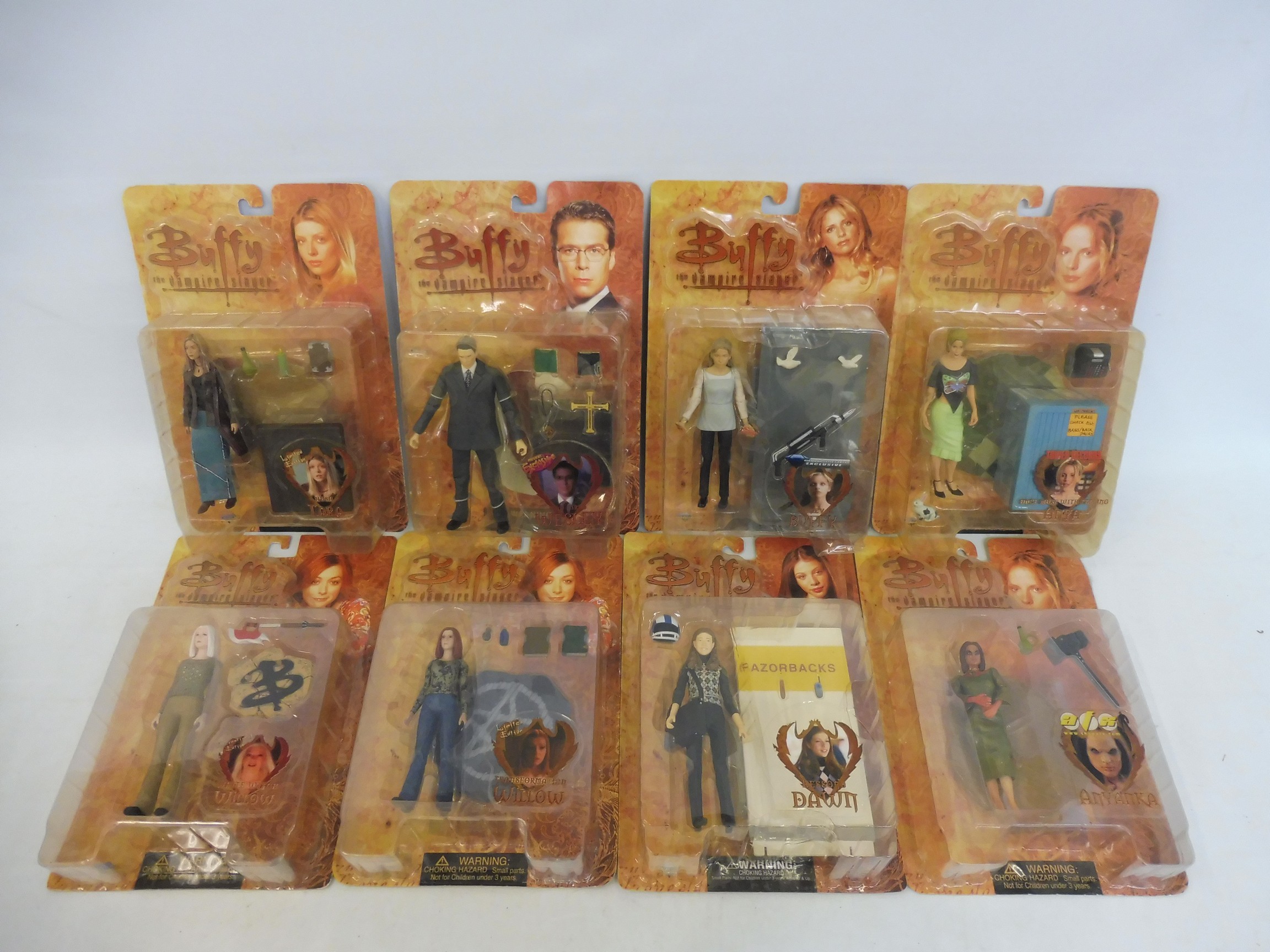 Eight Buffy carded figures.