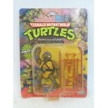 A Playmates card - Teenage Mutant Ninja Turtles Donatello, circa 1988. Card with edge buffering,