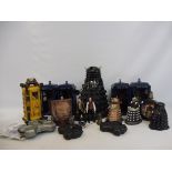 A selection of Dr. Who collectables and accessories including four tardis', several daleks (