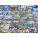 A large quantity of Lego instruction booklets, various to include Star Wars, Lego City and