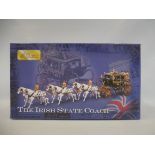 A boxed Britains Irish state coach, appears near mint.