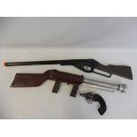 Three period juvenile guns: a Daisy pellet gun, a Newell Sub Machine gun and a hand gun.