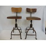 A pair of original circa 1950s industrial workshop chairs, swivel mechanism to adjust height,