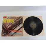 A rare The Beatles Please Please Me on Black and Gold Parlophone Mono, vinyl and cover in good