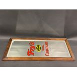 A Fry's Extra Cream Milk Chocolate narrow advertising mirror in an oak frame, 11 1/2 x 29 3/4".