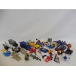 A box of mixed generation smaller scale Transformers, accessories and parts.