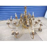 A large and impressive 18 branch brass chandelier.
