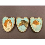 Three miniature heart shaped Clarnico cachou tins in very good condition.