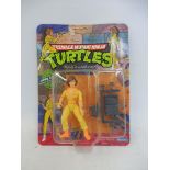 A Playmates carded figure - Teenage Mutant Ninja Turtles April O'Neill, circa 1988. Card and blister