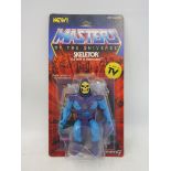 A carded Masters of Universe Super Seven edition Skeletor.