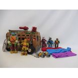 A box of Teenage Mutant Ninja Turtles toys including van and figures.