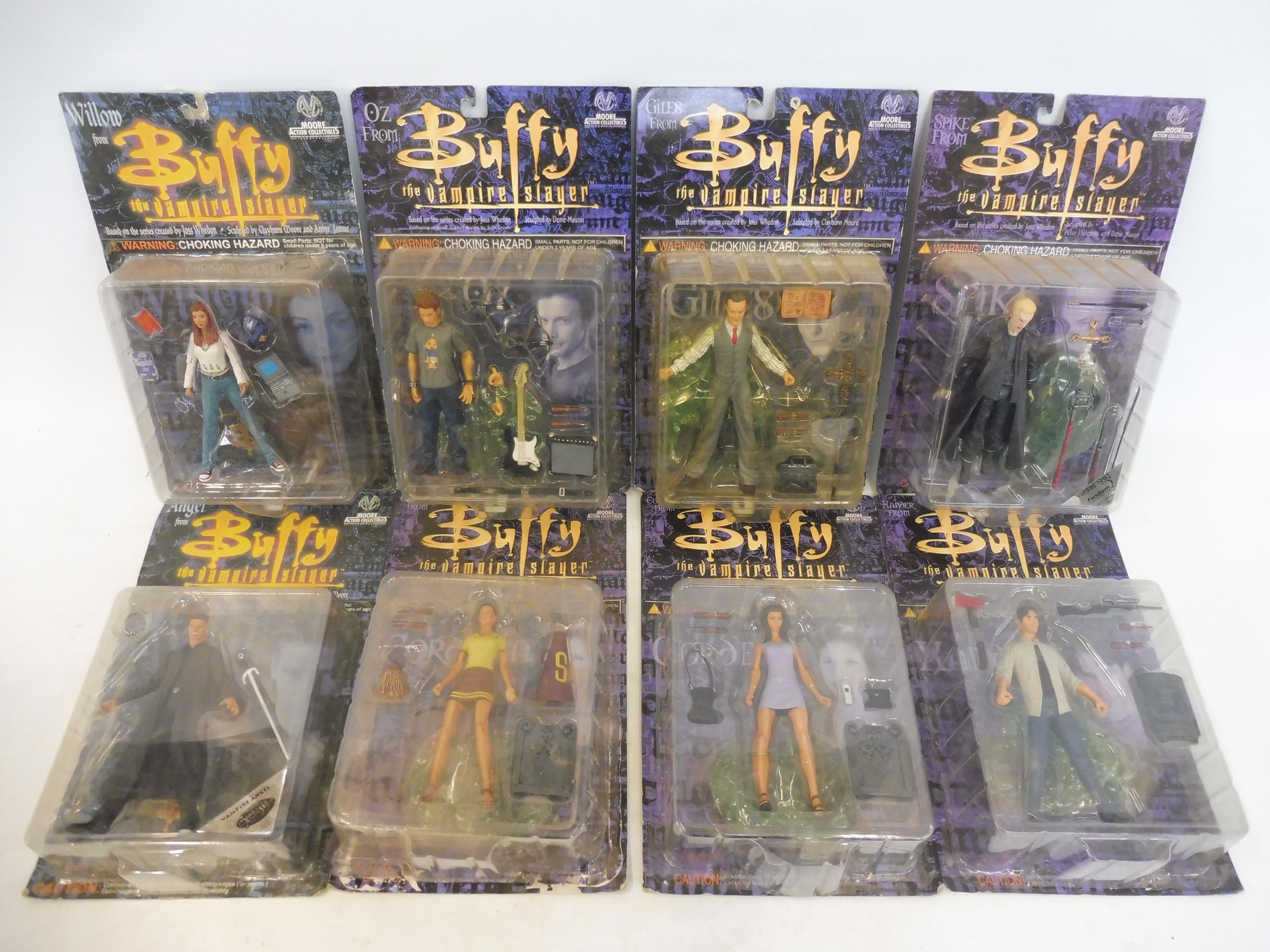 Eight Buffy carded figures.