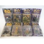 Eight Buffy carded figures.