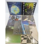 Seven Yes LPs to include Fragile, Close to The Edge and others with inserts and a poster.