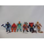 Masters of The Universe - a selection of action figures along with weapons and accessories including