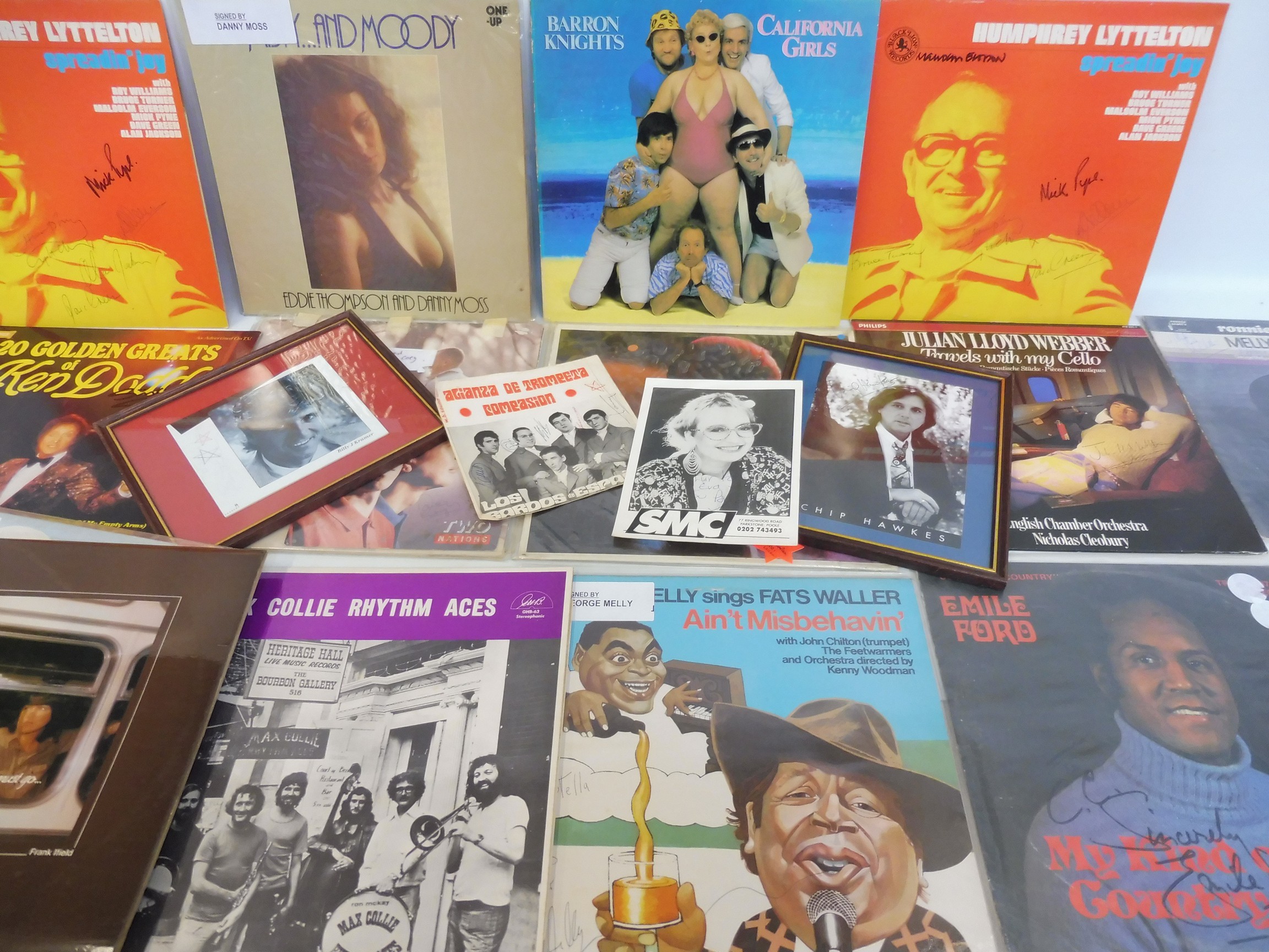 A collection of signed LPs, signed photographs, pamphlets etc. to include George Melly, The Hollies,