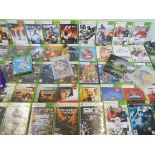 X Box 360 - a large quantity of games, discs and loose cases (approximately 100+).