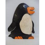 A hand painted fairground penguin from a hoopla type stall, circa 1970s, 24 x 18".