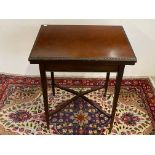 An Edwardian mahogany rectangular fold over card table, 20" w x 27 1/2"h x 14" d.