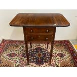 A 19th Century mahogany and boxwood strung drop flap table with single deep drawer raised upon