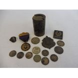 A small quantity of silver coins, a Bristol Magic Society pendant, a Belstaff badge etc.