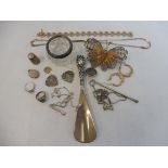 A tray of assorted silver including a filigree butterfly brooch, necklace, earrings etc.