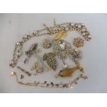 A selection of paste decorative reptile and other brooches etc.