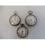 Three small pocket watches with enamel dials.