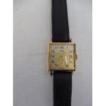 A cased Art Deco yellow metal wristwatch marked Trebex to the dial.