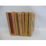 Nine early Beatrix Potter books.