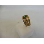 A cased 9ct gold dress ring set with jade.