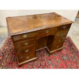 A walnut twin pedestal writing desk, late 19th Century in a Georgian style, 41" w x 30" h x 21 1/