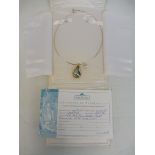 An HK Tahitian Mabe pearl and diamond enhancer from the Pearl Factory, Hawaii, with certificate of