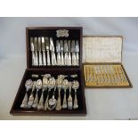 A cased set of six silver handled knives and forks plus a part canteen of cutlery.