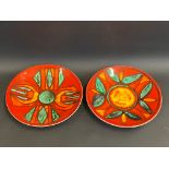 Two circular Poole pottery shallow bowls, 10 1/2" diameter.