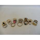 A quantity of assorted decorative rings.