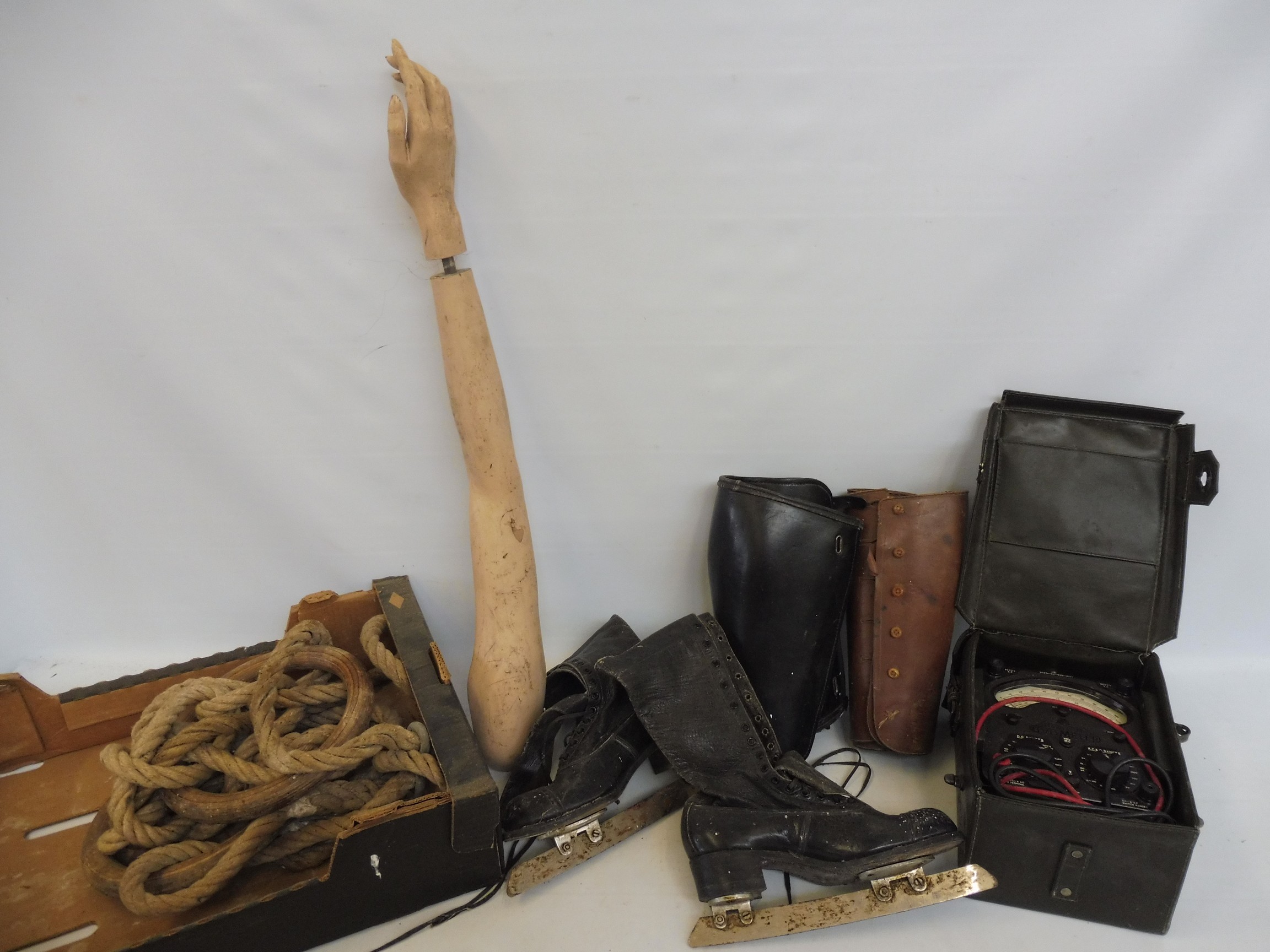 A pair of gymnastics rings, a pair of leather lady's skates, various leather gaiters and an AVO