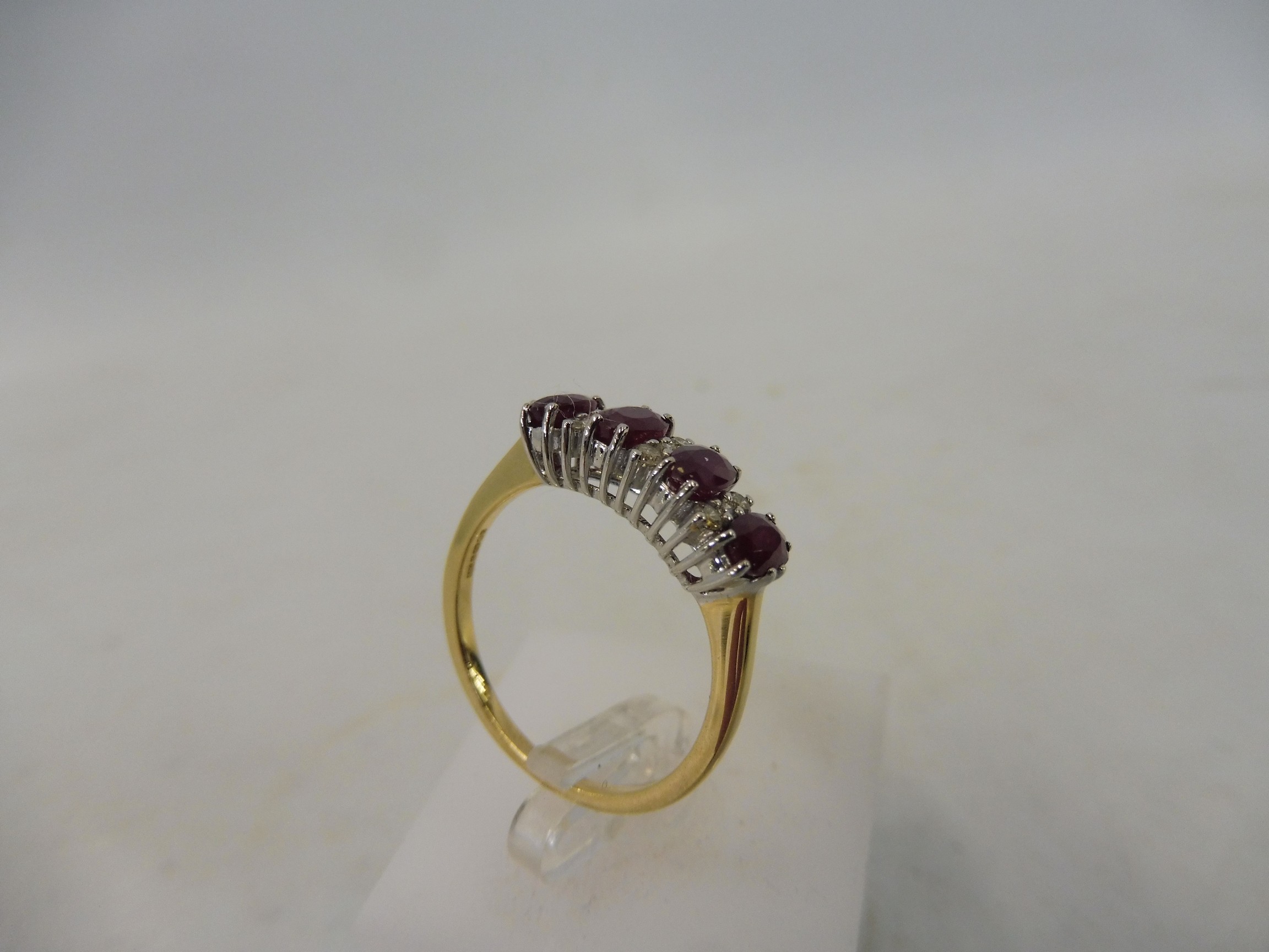 An 18ct gold and 1.12 diamond and ruby ring. - Image 3 of 4