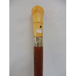 A silver mounted malacca walking cane dated 1891 set with a banded agate to the knop.