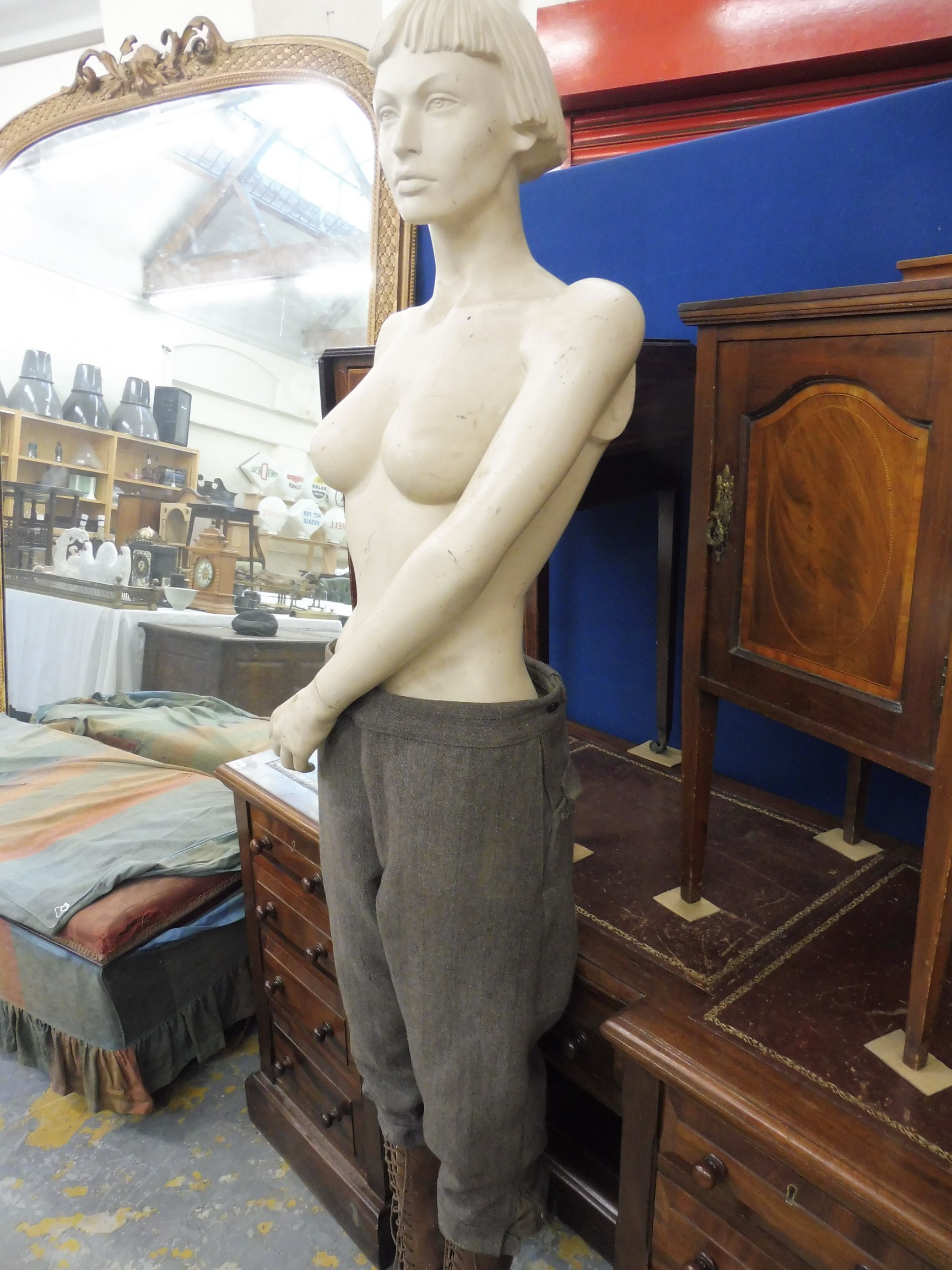 A one-armed female mannequin clothed from the waist down including tall brown leather lace up boots. - Image 2 of 3