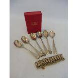 An unusual gilded white metal bracelet plus six silver teaspoons.