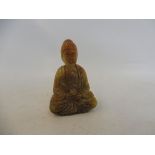 A soapstone buddha.