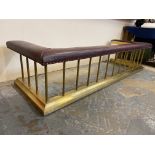 A large brass and leather upholstered club fender, overall length 86", inside measurement 70"w,