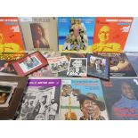 A collection of signed LPs, signed photographs, pamphlets etc. to include George Melly, The Hollies,