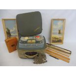 A collection of assorted items including a brass crest, two oils on board, seascapes, rules etc.