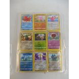 A folder of approx. 300 pokemon cards including many sword and shield hollograms.