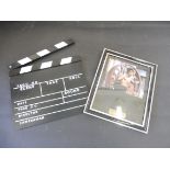 A Jackie Chan 'Enter the Dragon' film cell plus a film making clapper board.
