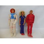 Three Six Million Dollar Man figures to include the bionic woman, badge still attached, two Steve