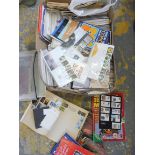 A large quantity of first day covers, comic books etc.